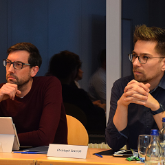 Participants of the conference listening